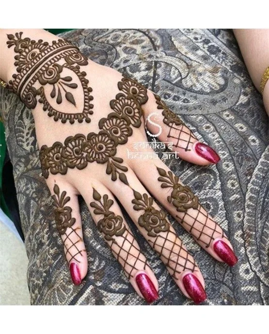 Minimal Blossom And Band Covering Back Hand Mehndi Design Minimal Blossom And Band Covering Back Hand Mehndi Design